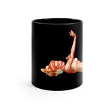 Pin-up Girl Lying On Her Back Printed On A Black Coffee Mug