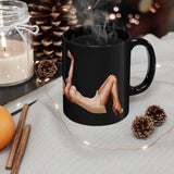 Pin-up Girl Lying On Her Back Printed On A Black Coffee Mug With Hot Coffee